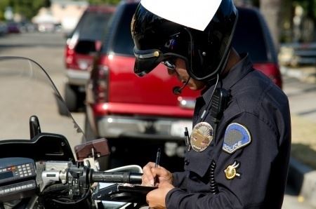 cop writing ticket 