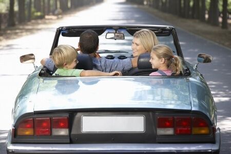 family in car